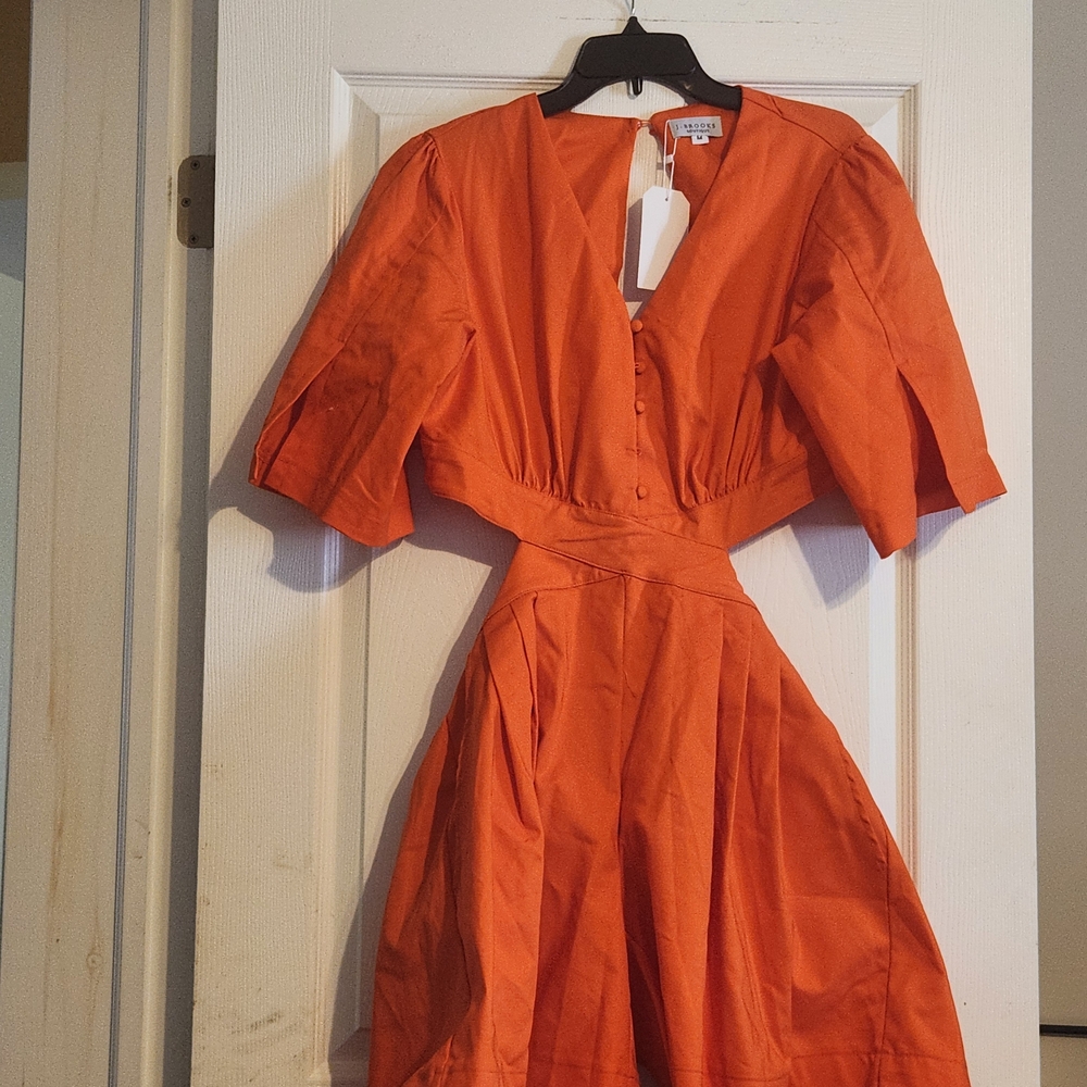 Orange Open Back Jumpsuit.